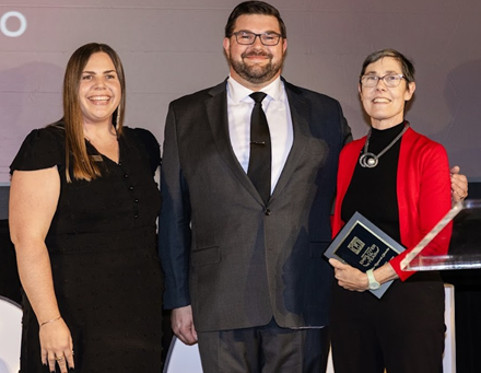 Photo of CRL Director for Collections Access and Technology Amy Wood with Best Buddies International team members.
