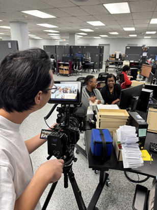 CRL’s Metadata Team Program Officer Yoseline Louisma with CRL Metadata Assistant Briony Mikell in the work room.