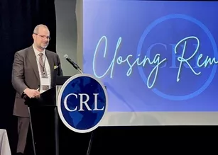 Photo of Jacob Nadal presenting at a CRL event.